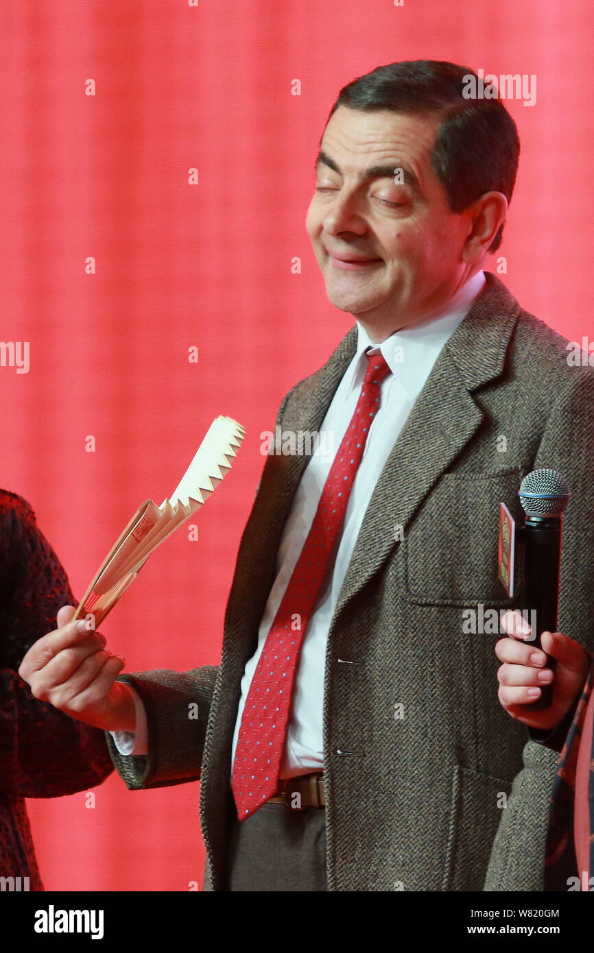 English actor Rowan Atkinson plays Mr. Bean during a premiere for his movie  