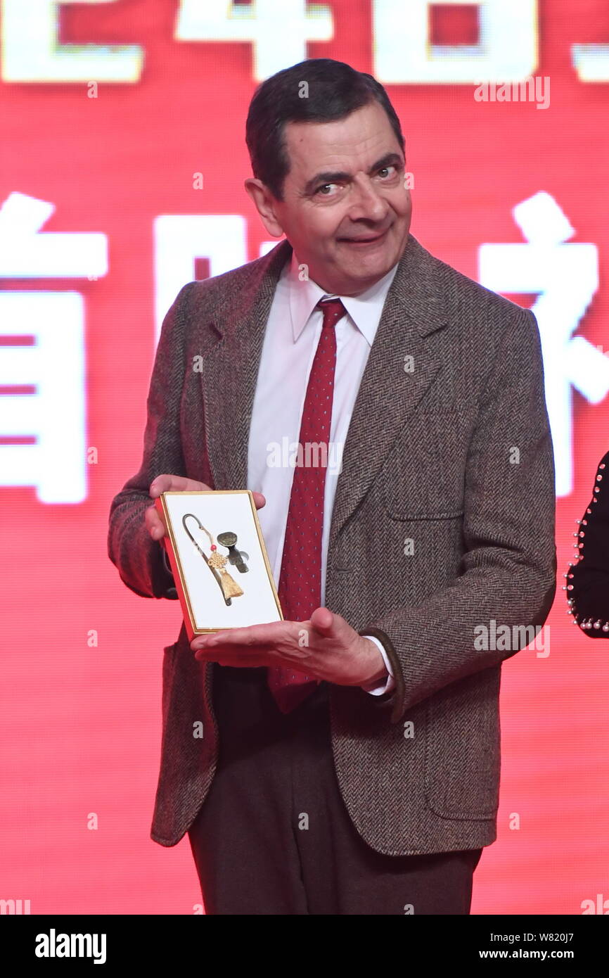 English actor Rowan Atkinson plays Mr. Bean during a premiere for his movie  