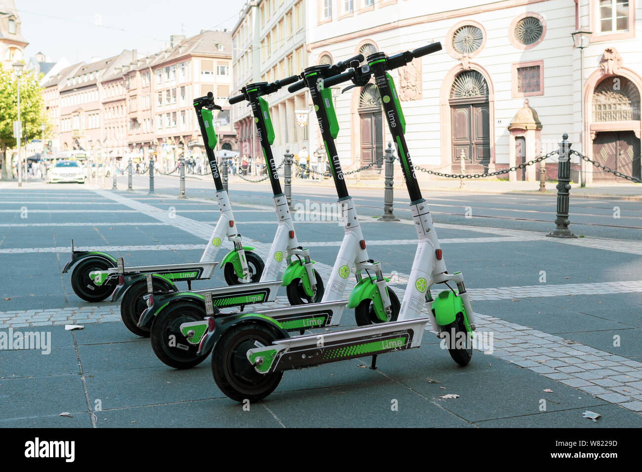 Lime dock free electric scooters in Frankfurt am Main, Germany Stock