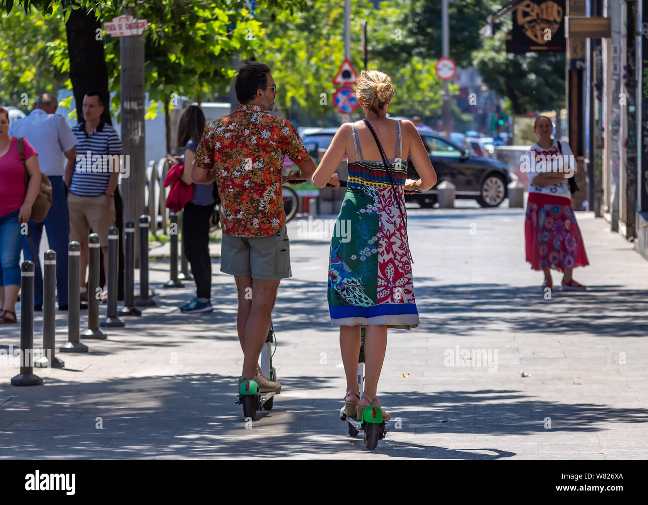 Bucharest, Romania August 07, 2019 People ride LimeS Electric