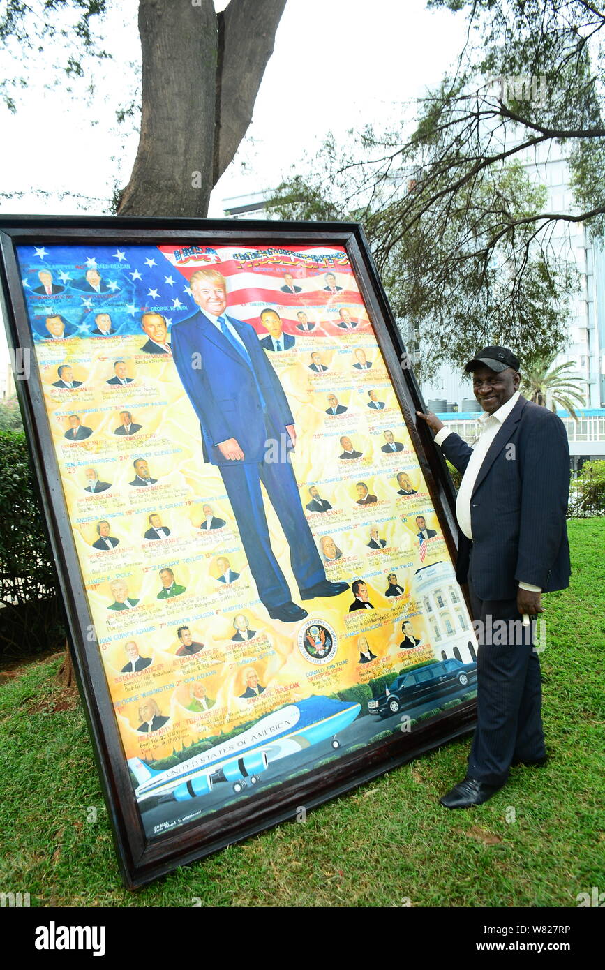 The painting artist Joackim Ndalo stands next to his artwork of all the US Presidents to the current Donald Trump displayed at the August 7th Memorial Park.The park sits at the scene of 1998 US Embassy bombing that left 213 people dead. As the victims of this terror attack mark 21st commemoration, they feel neglected and are still asking for compensation. Stock Photo