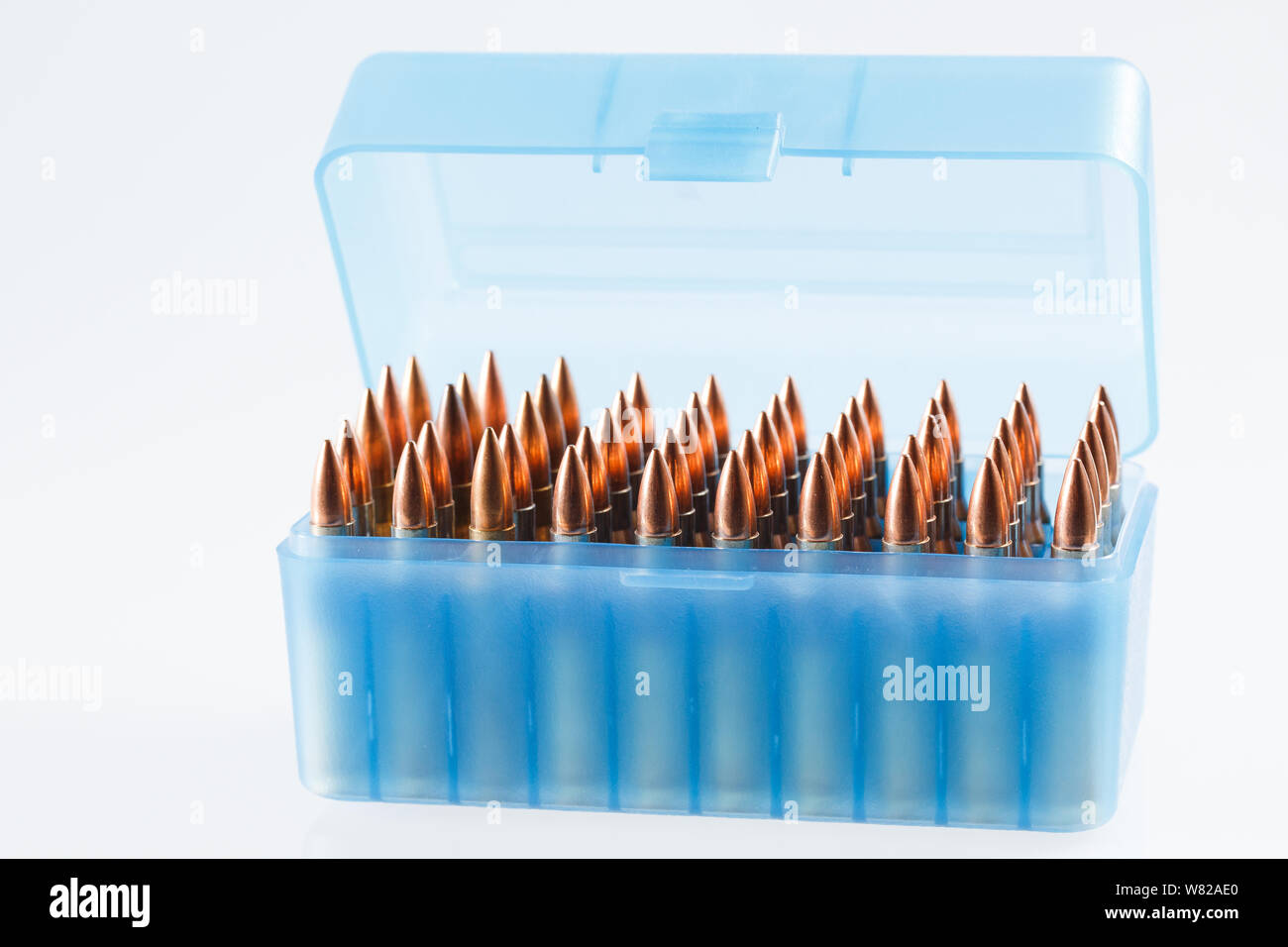 Hunting cartridges in a plastic box. Bullet storage box Stock Photo - Alamy
