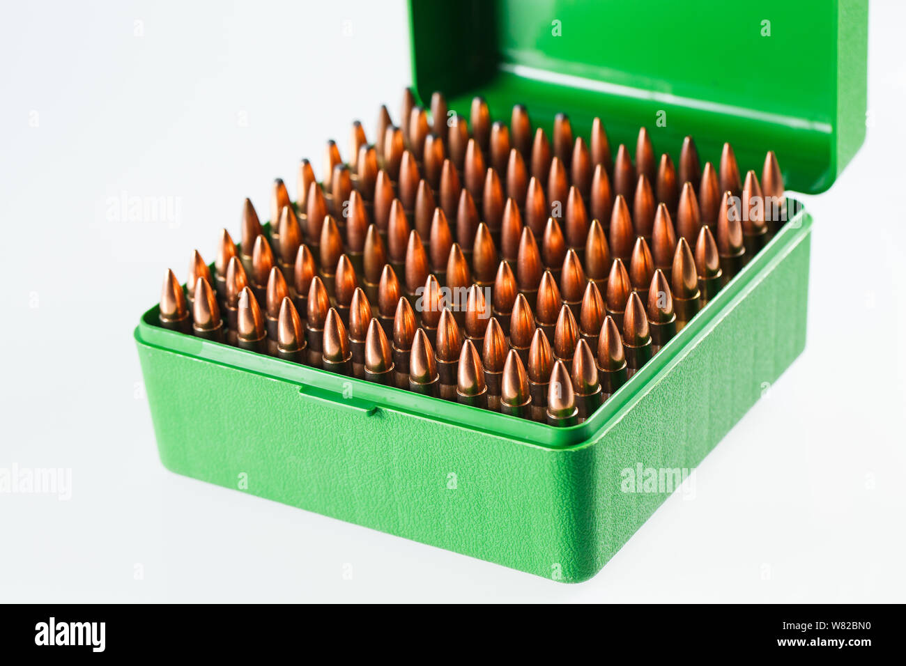 Hunting cartridges in a plastic box. Bullet storage box Stock Photo - Alamy