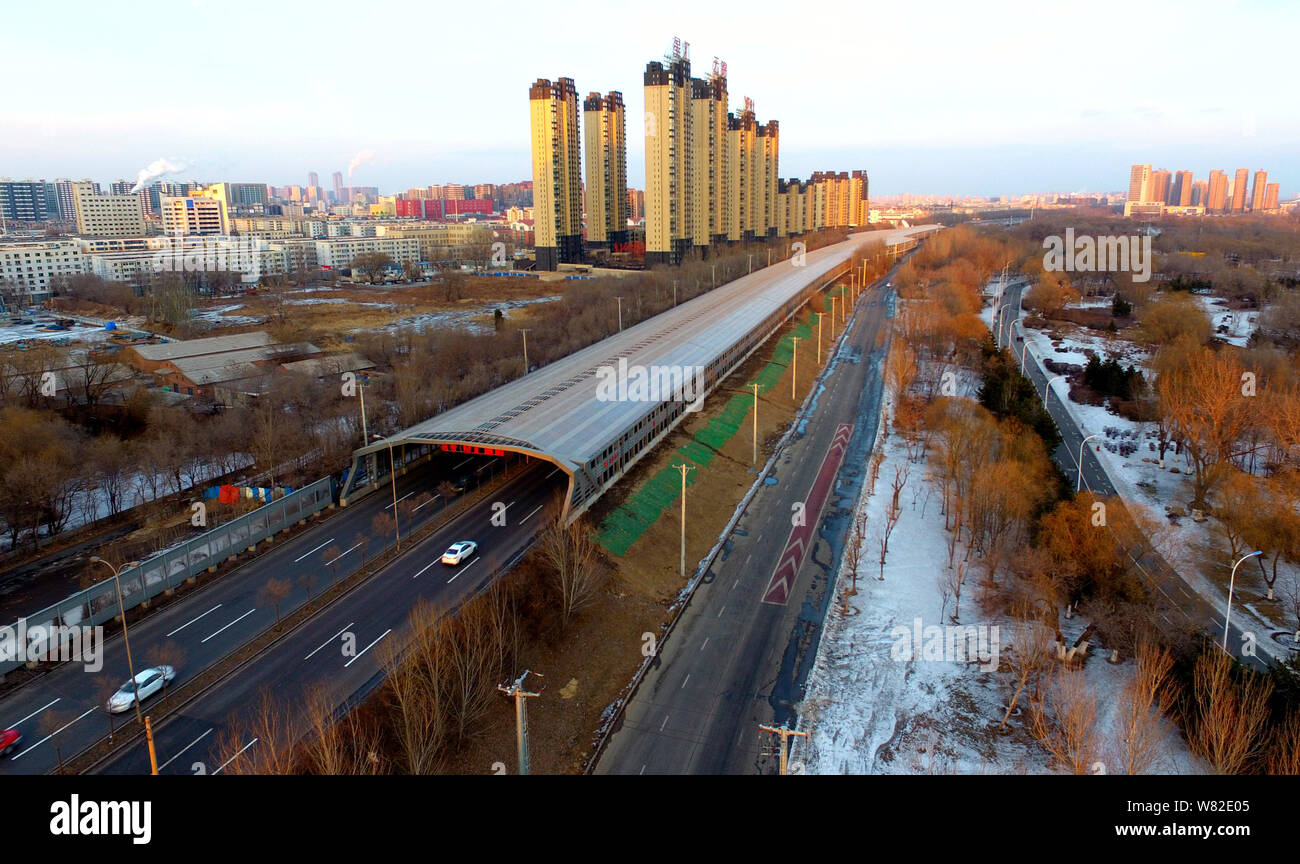 Aerial view of the construction site of an elevated road fully covered by noise-reduction shelters in Shenyang city, northeast China's Liaoning provin Stock Photo