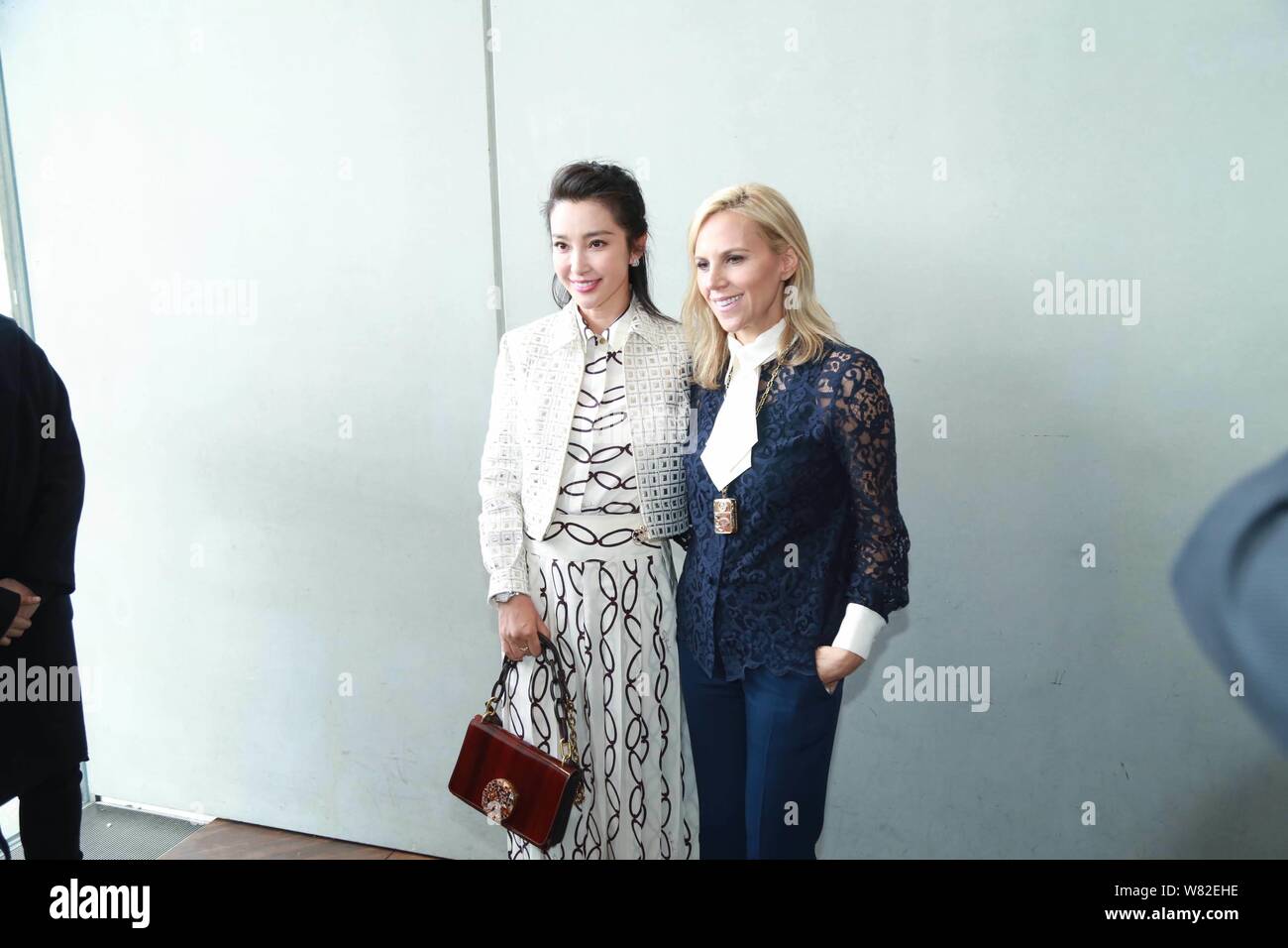Chinese actress Li Bingbing, left, and American fashion designer Tory Burch  pose at the Tory Burch fashion show during the New York Fashion Week Autum  Stock Photo - Alamy