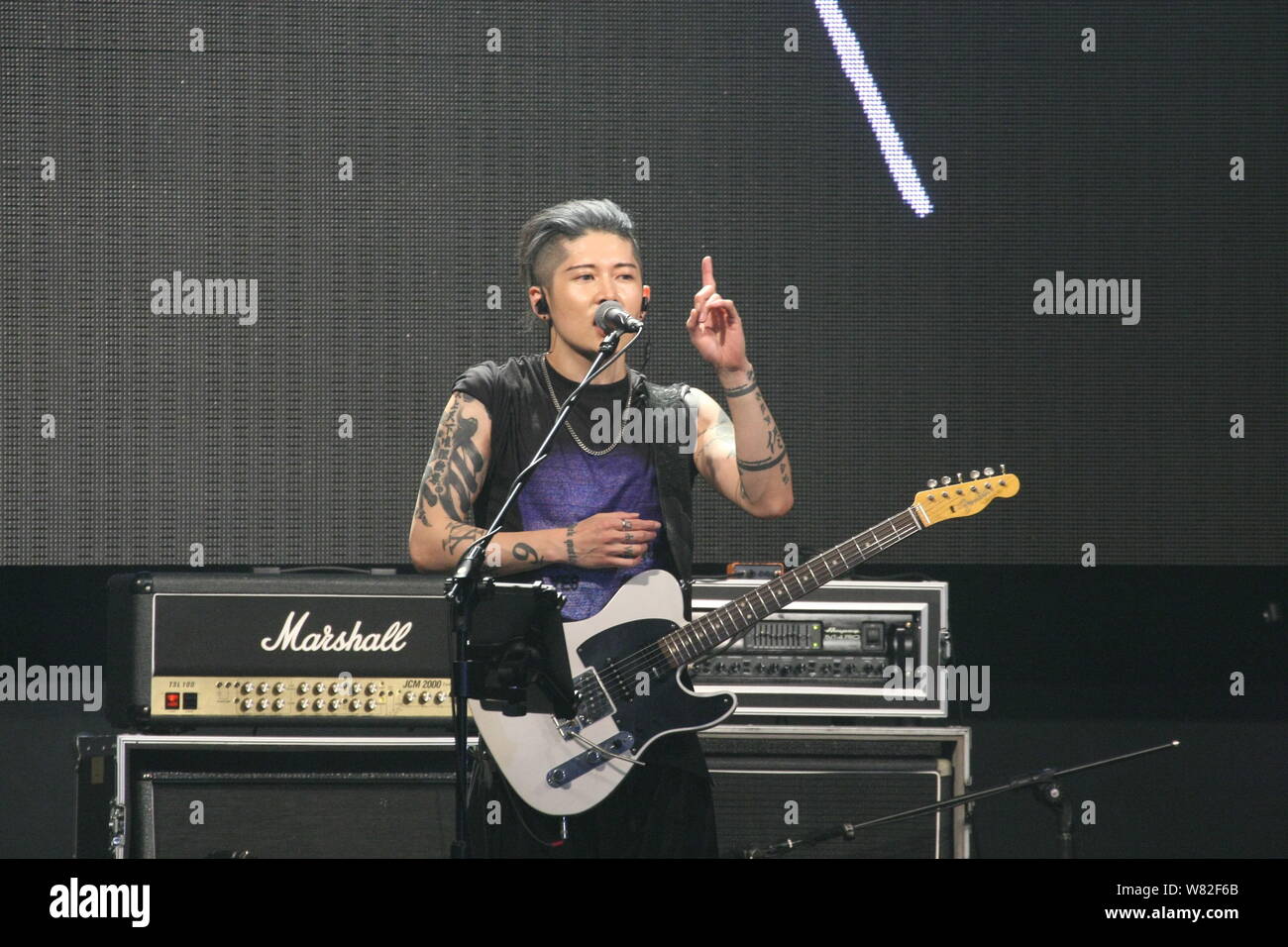 Japanese singer and actor Takamasa Ishihara, better known by his stage name Miyavi, performs during a concert in Taipei, Taiwan, 26 February 2017. Stock Photo
