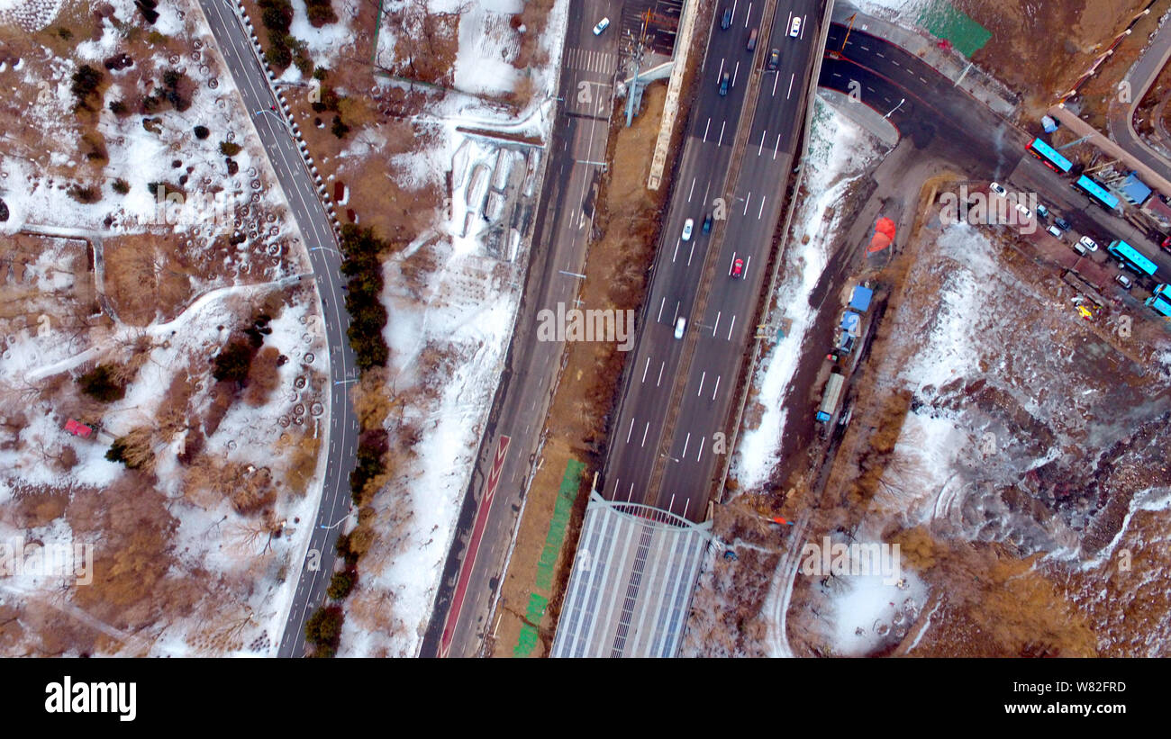 Aerial view of the construction site of an elevated road fully covered by noise-reduction shelters in Shenyang city, northeast China's Liaoning provin Stock Photo