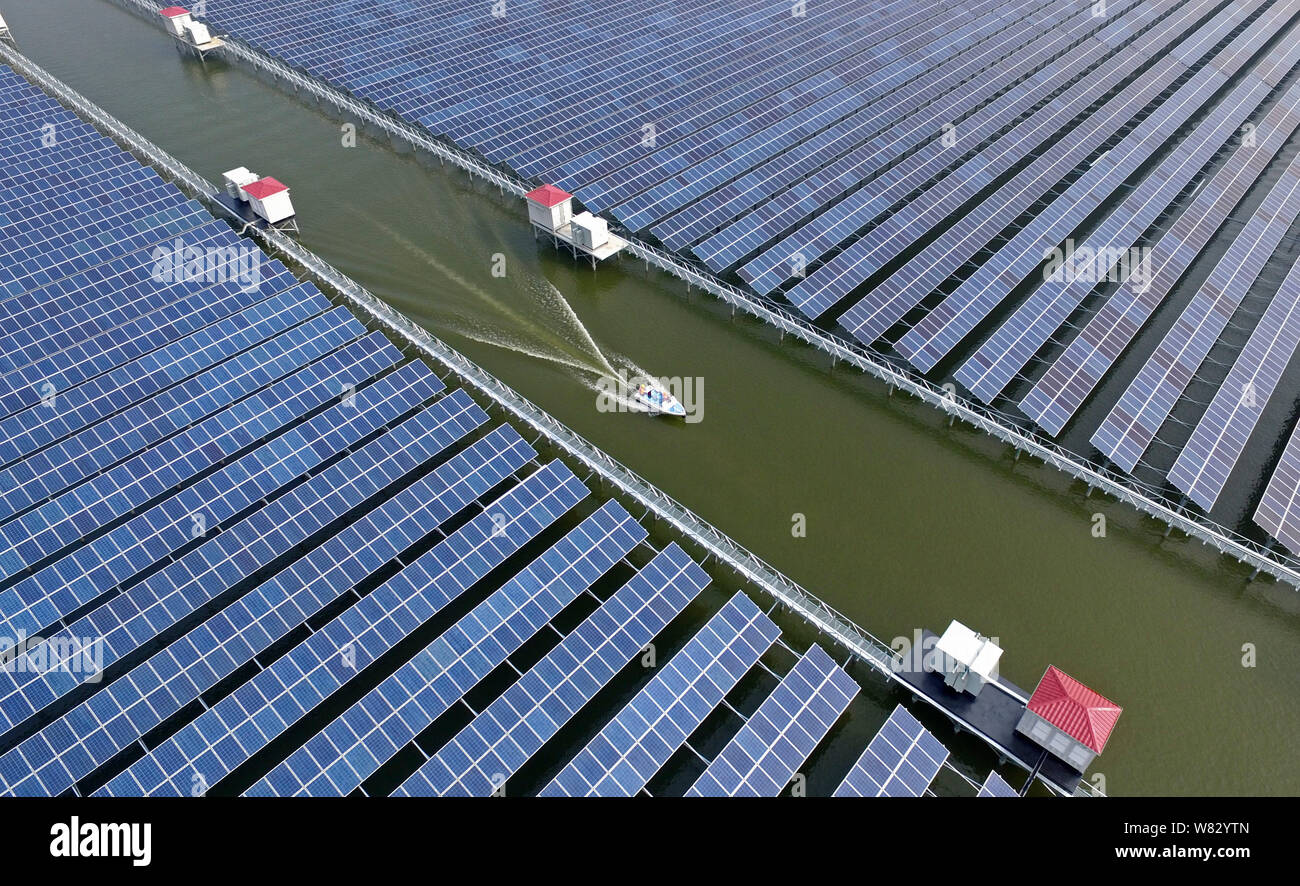 Aerial view of solar panels in China's largest photovoltaic (PV) power station built on a fish farm in Cixi city, east China's Zhejiang province, 11 J Stock Photo