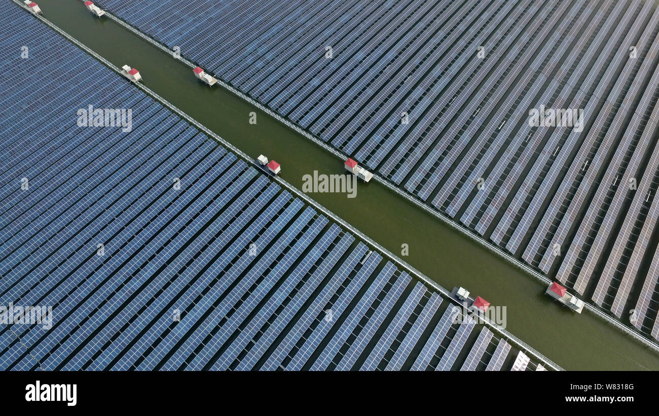 Aerial view of solar panels in China's largest photovoltaic (PV) power station built on a fish farm in Cixi city, east China's Zhejiang province, 11 J Stock Photo