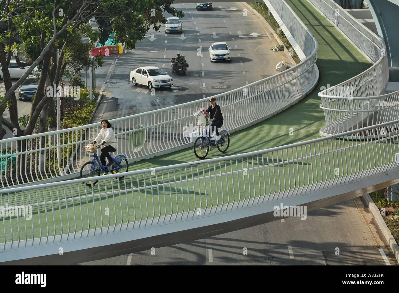 Cyclists ride on China s first elevated bicycle track constructed above the ground in Xiamen city southeast China s Fujian province 23 January 2017 Stock Photo Alamy