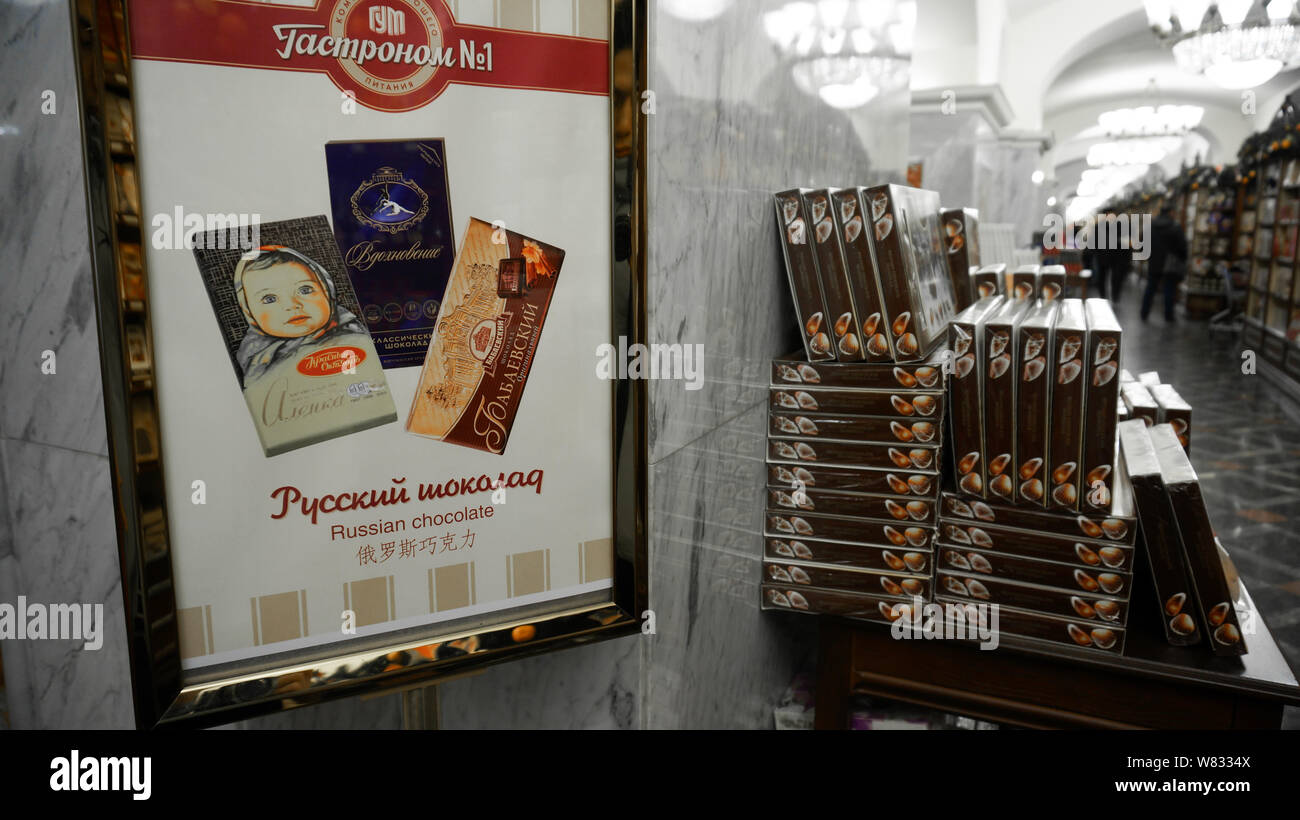 Russian chocolates are for sale for international tourists at a shopping mall in Moscow, Russia, 12 January 2017. Chinese signs make it available for Stock Photo