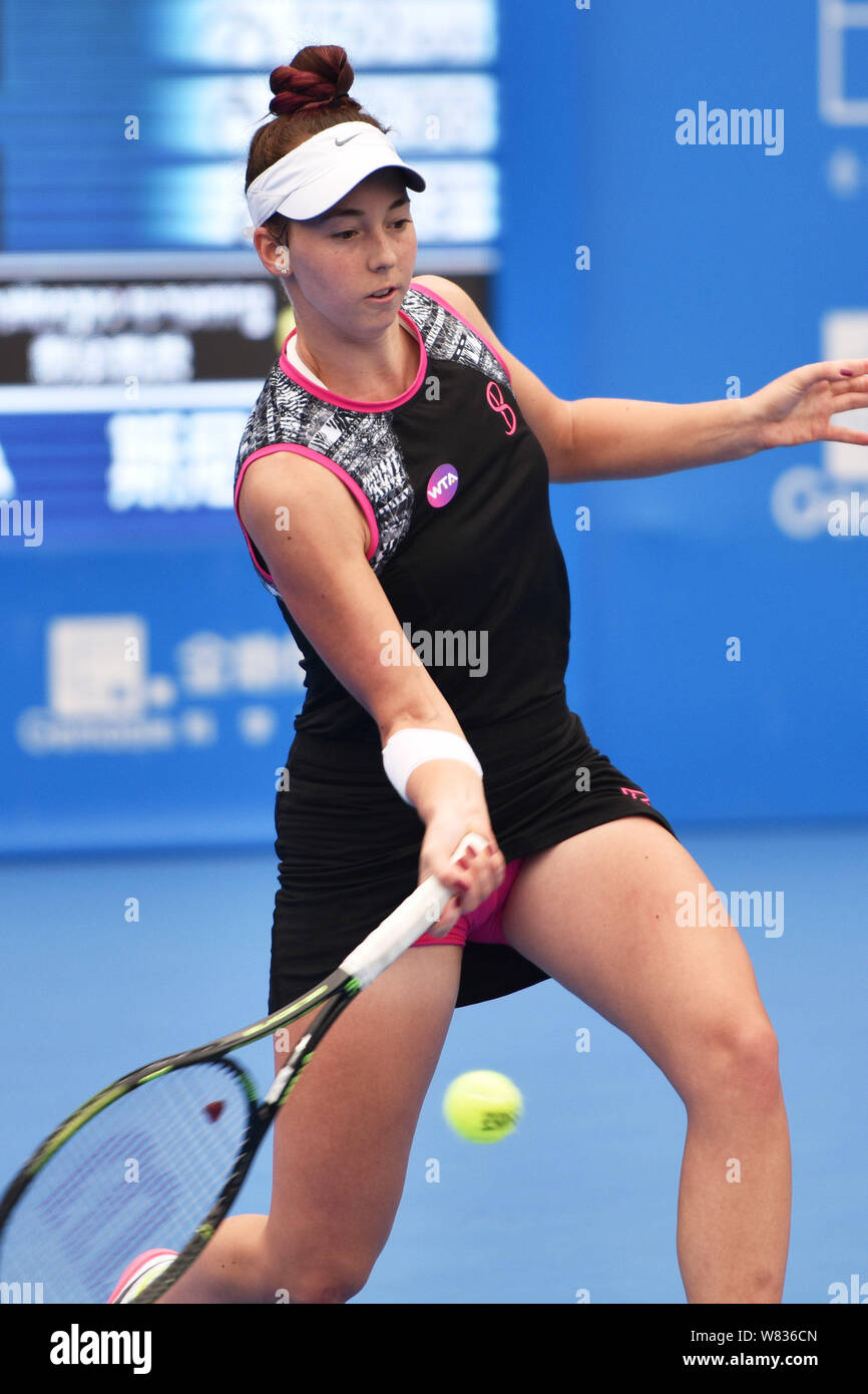 Nina Stojanovic of Serbia returns a shot to Katerina Siniakova of Czech  Republic in their women's singles quarter-final match of the WTA 2017  Shenzhen Stock Photo - Alamy