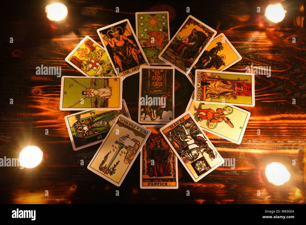 tarot cards for tarot readings psychic as well as divination with candle  light / fortune teller reading future or former and present Stock Photo -  Alamy