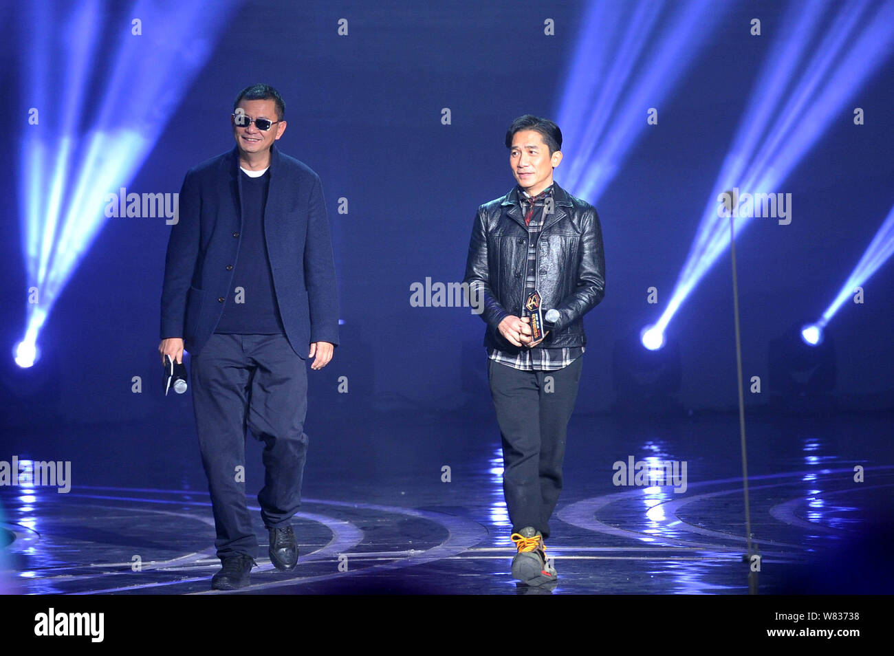 Hong Kong director Wong Kar-wai, left, and actor Tony Leung attend