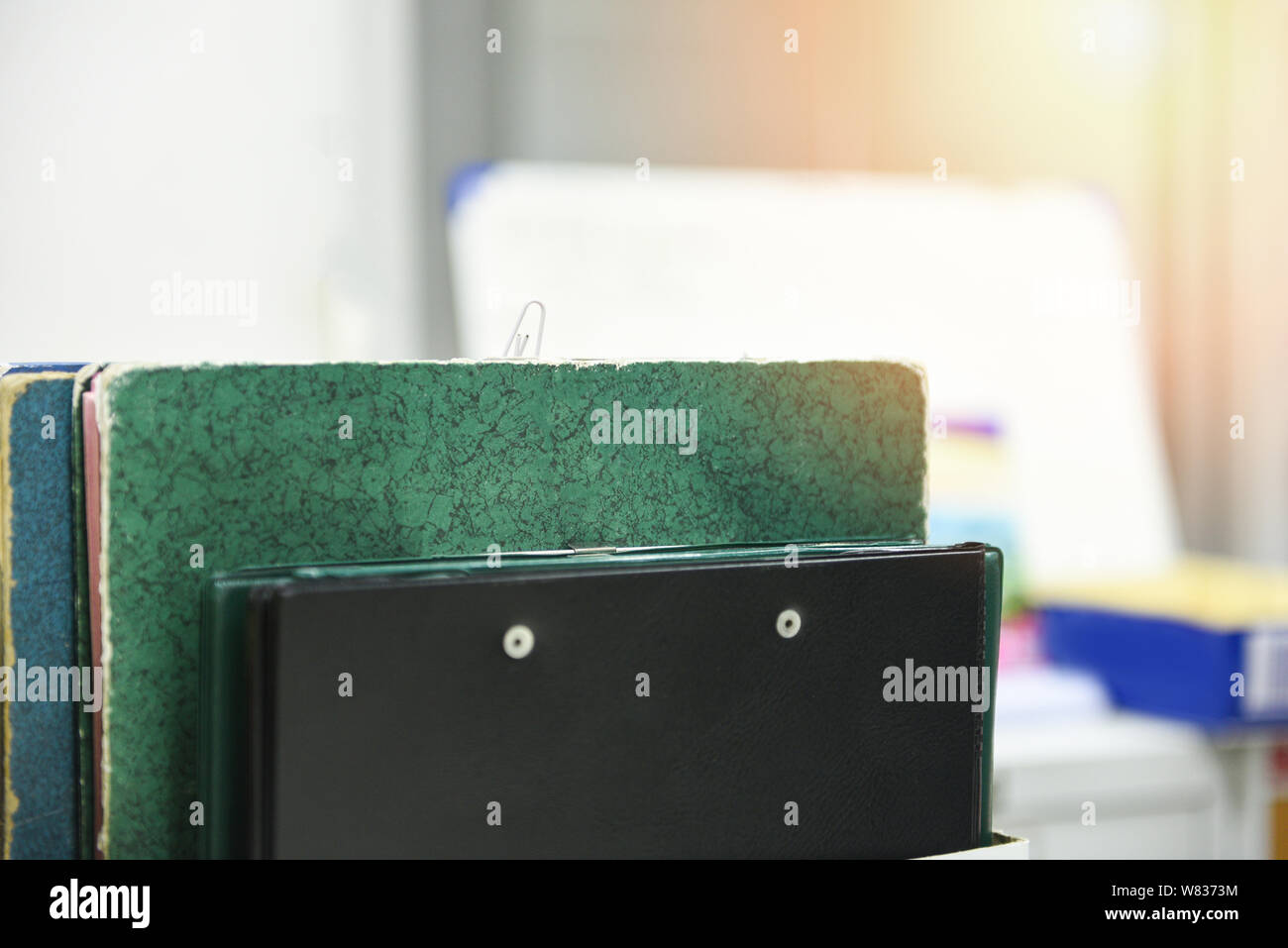 Documents in files placed in the filing / business paper document file sort in a office