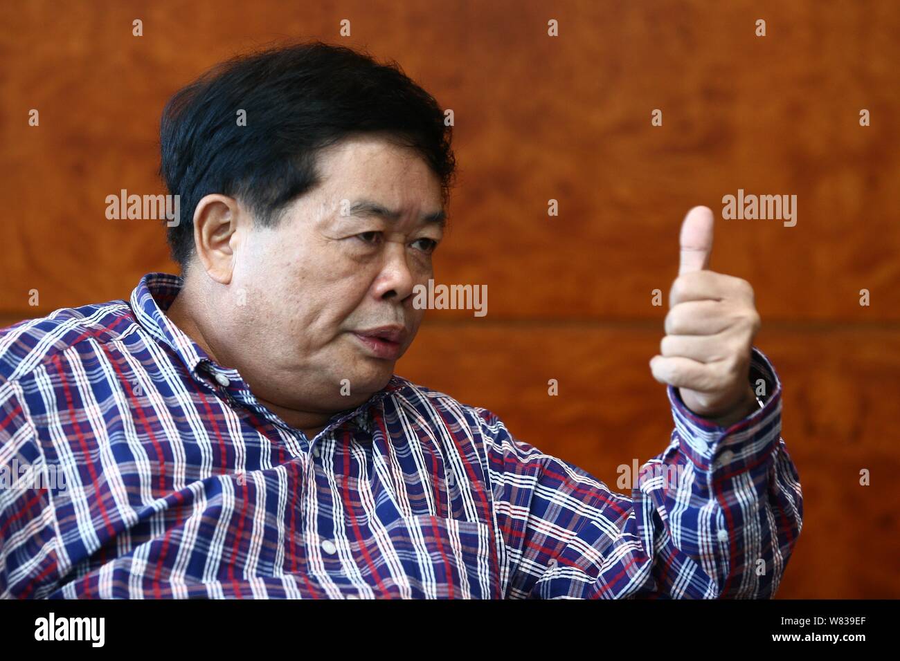 –FILE–Cho Tak Wong (Cao Dewang), Chairman of Fuyao Group and Chairman