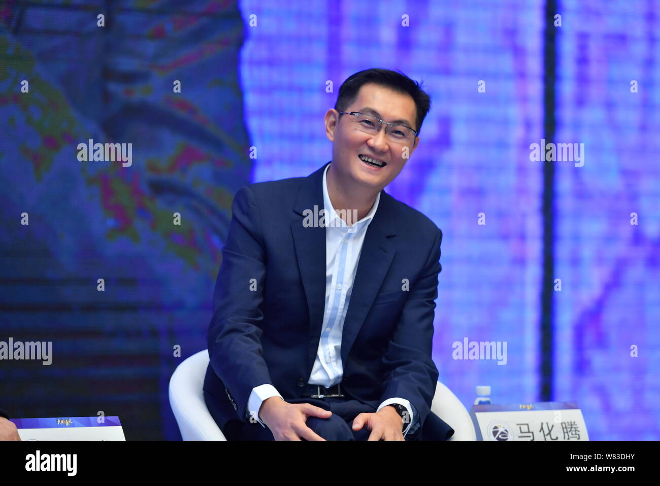 Pony Ma or Ma Huateng, Chairman and CEO of Tencent, reacts during the 2nd China Shenzhen Entrepreneurs Convention in Shenzhen city, south China's Guan Stock Photo