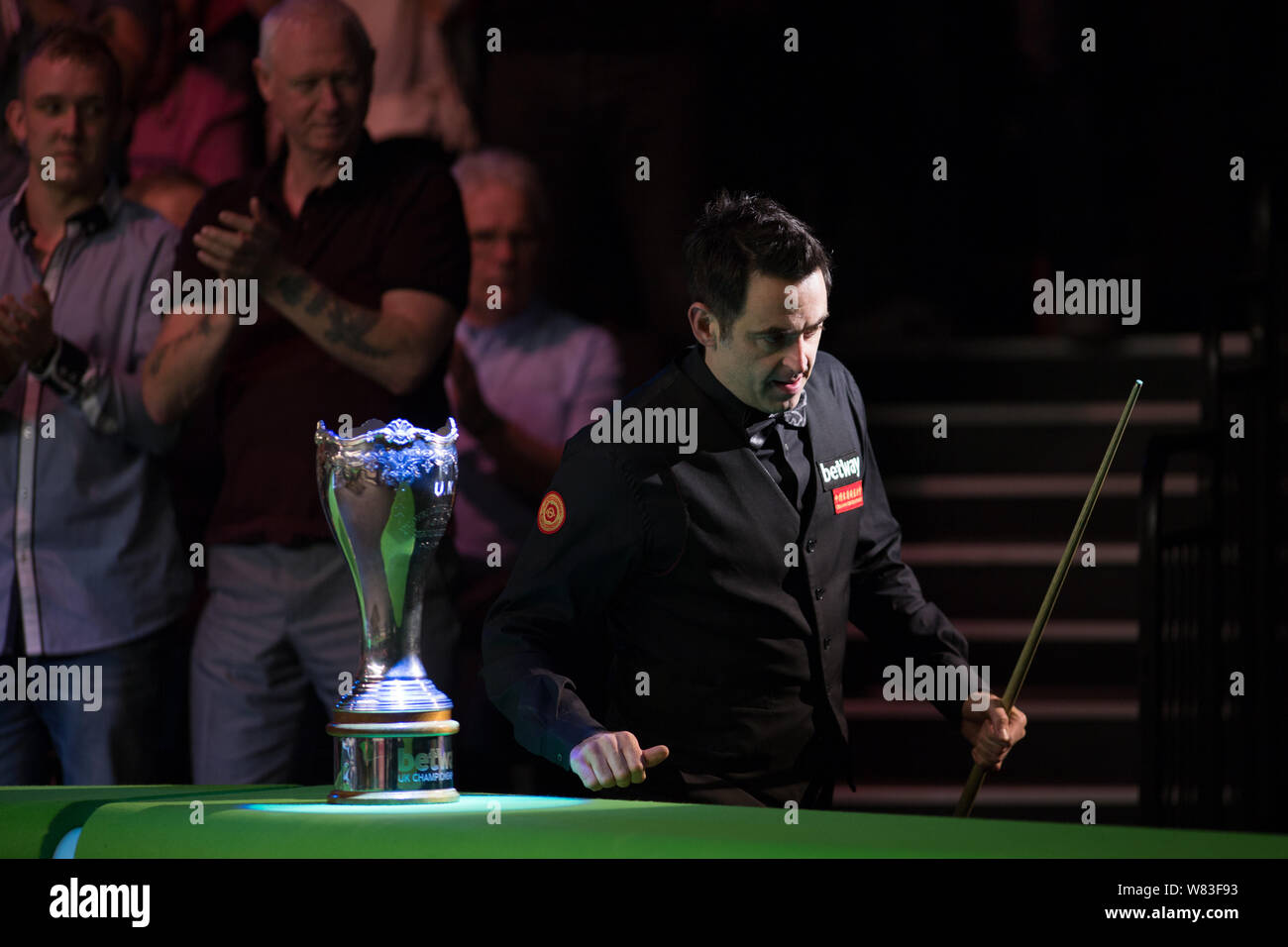 Ronnie O Sullivan Of England Walks Past The Champion Trophy In The
