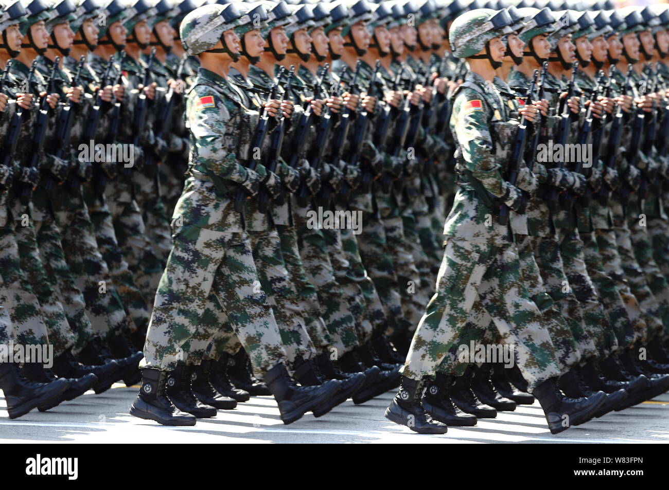 --FILE--Chinese PLA (People's Liberation Army) soldiers march past the ...