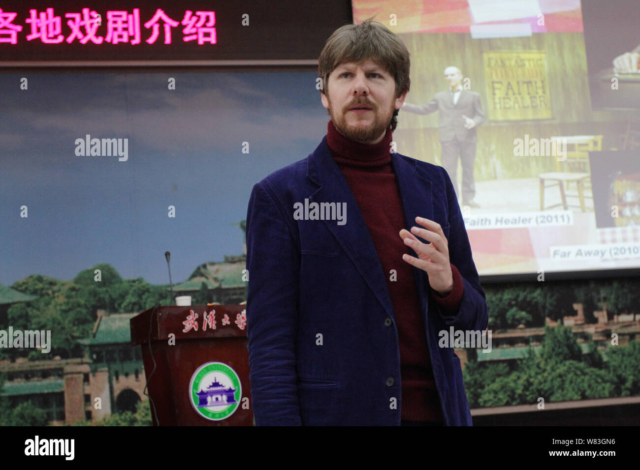 English theatre director Simon Godwin speaks during a lecture at the Wuhan University in Wuhan city, central China's Hubei province, 11 December 2016. Stock Photo