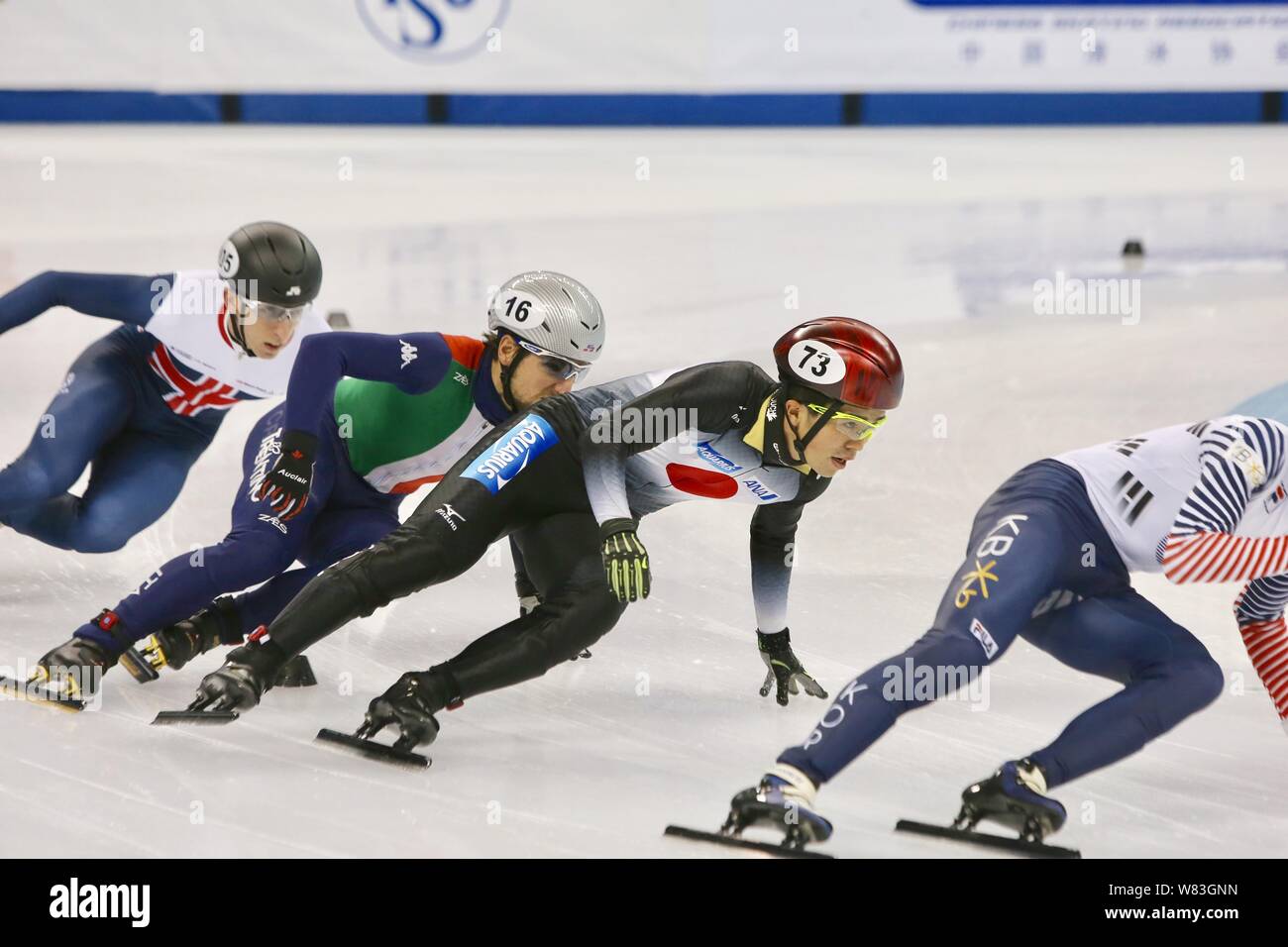 Japanese skater Yoshiaki Oguro, second right, competes in the men 500m