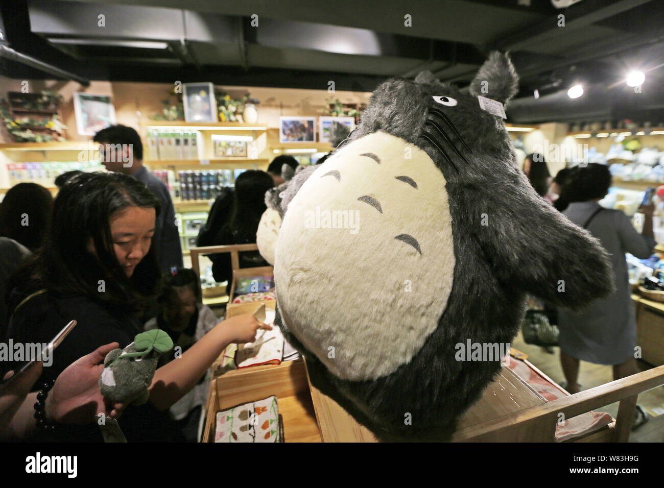 Chinese fans shop for peripheral products at a franchised store of