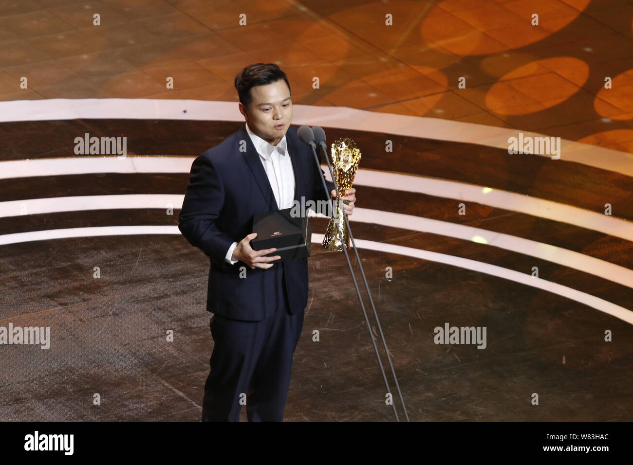 Chinese Olympic weightlifting gold medalist Long Qingquan speaks after receiving the Best Breakthrough Award during the presentation ceremony of the 2 Stock Photo