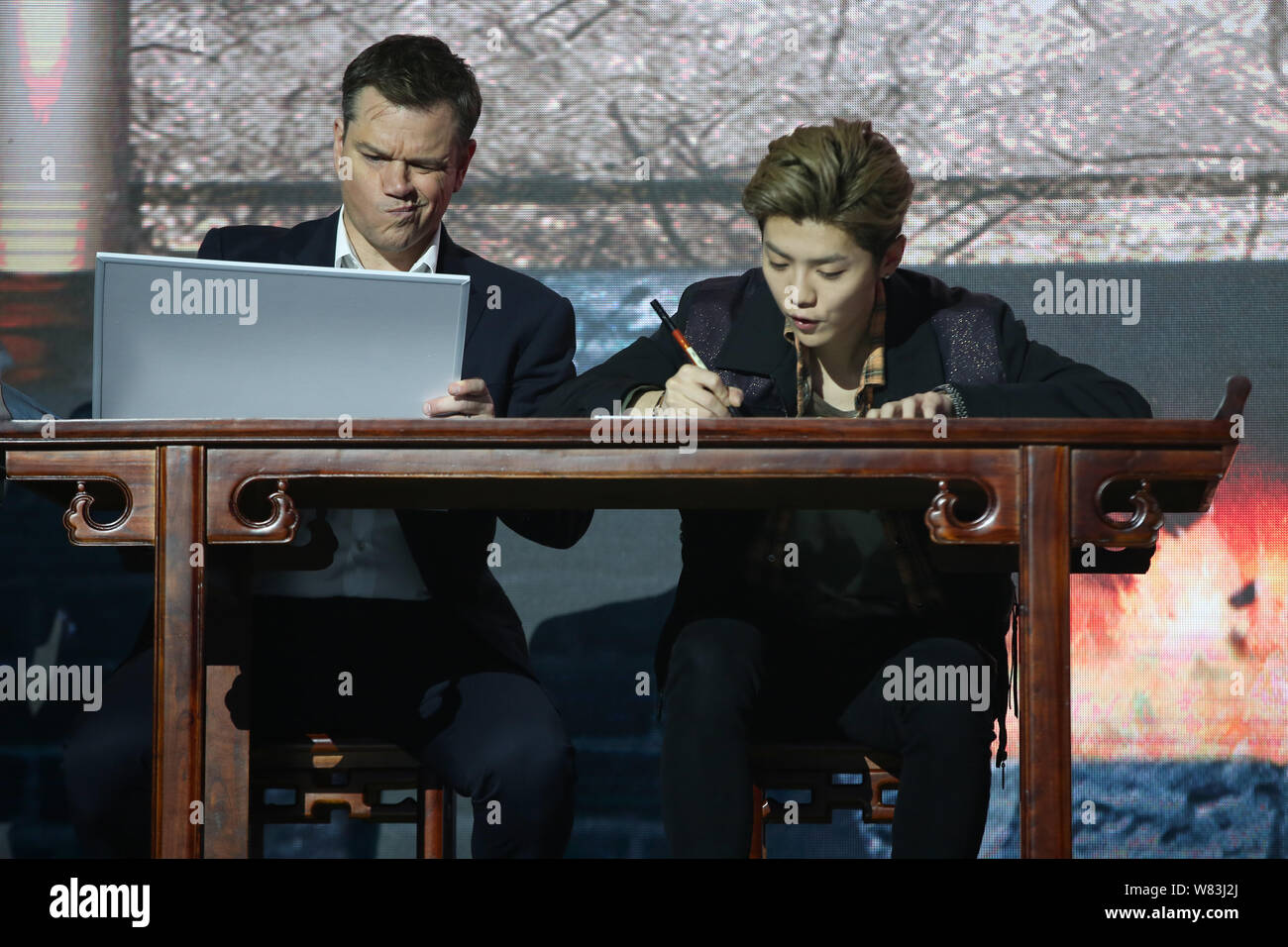 American actor Matt Damon, left, and Chinese singer and actor