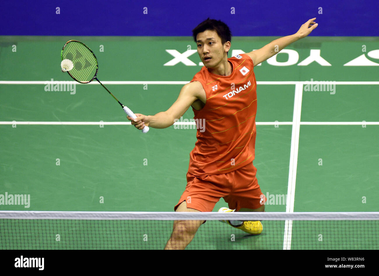 Riichi Takeshita of Japan plays a return shot to Rajiv Ouseph of England in  their men's singles match during the Hong Kong Open Badminton Championship  Stock Photo - Alamy