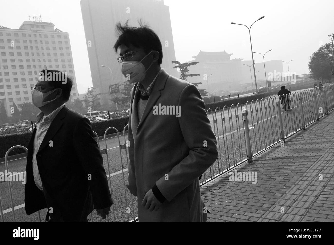 Air masks in smog Black and White Stock Photos & Images - Alamy