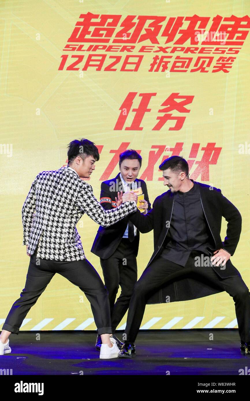 French actor David Belle, right, and Chinese actor Chen He, left, pose at a press conference for the premiere of their movie 'Super Express' in Shangh Stock Photo