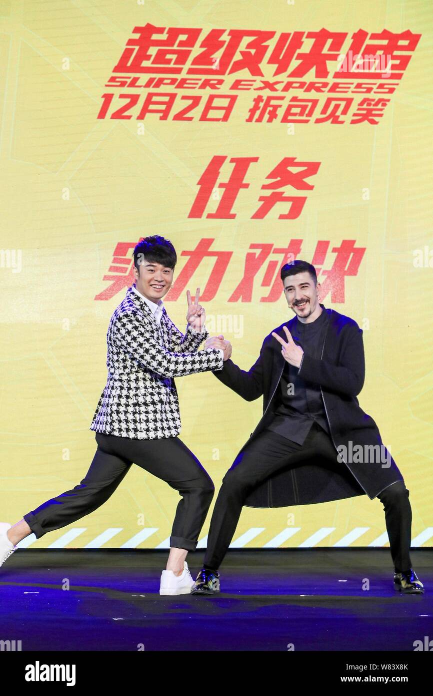French actor David Belle, right, and Chinese actor Chen He, left, pose at a press conference for the premiere of their movie 'Super Express' in Shangh Stock Photo