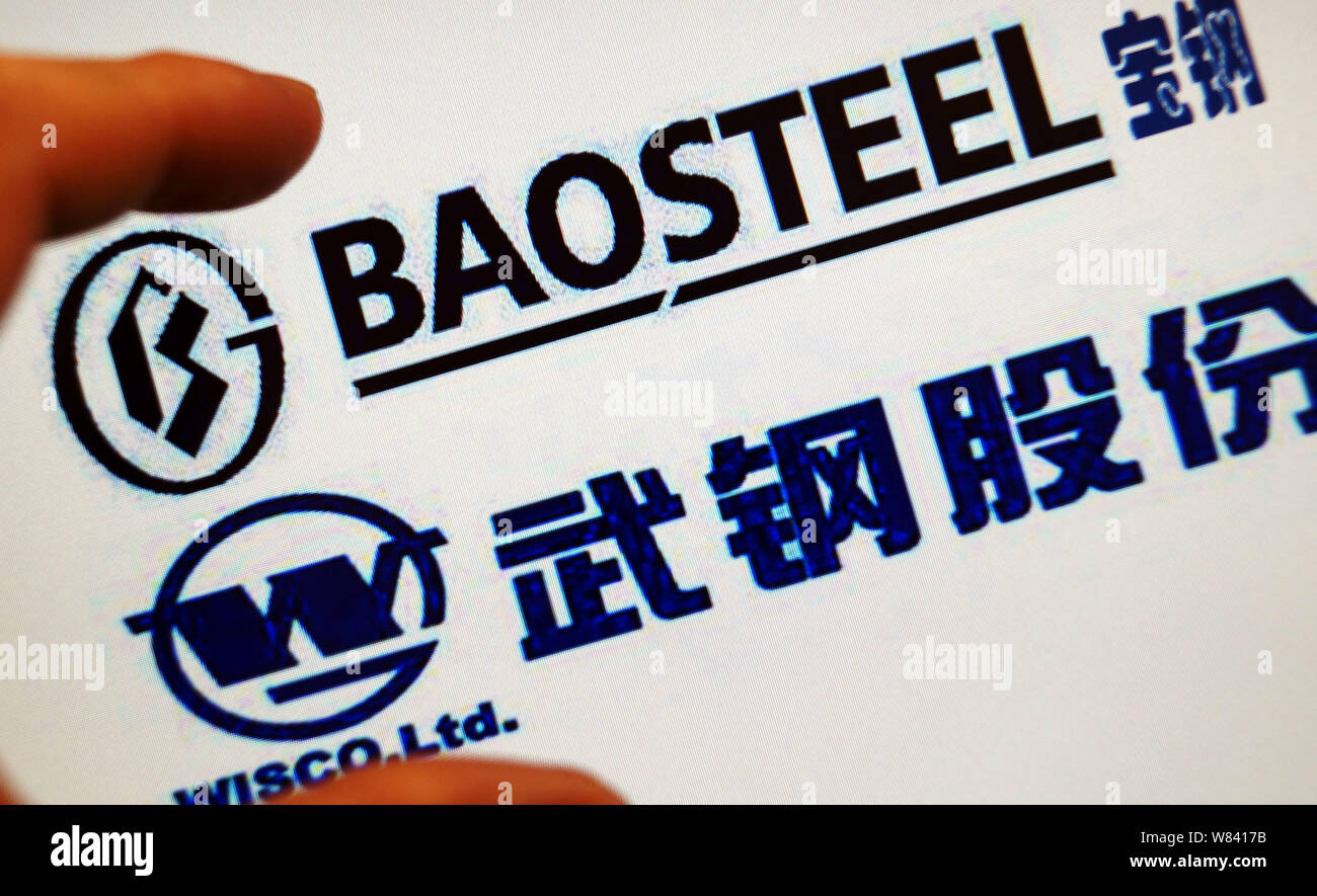 FILEA Chinese netizen looks at logos of Baosteel (Baoshan Iron and