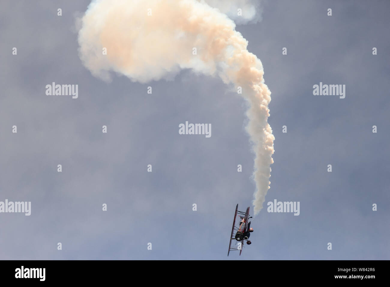 Sean D. Tucker - an aerobatic aviator who is sponsored by the Oracle,  performs acrobatic stunts in an airshow, Dayton Stock Photo
