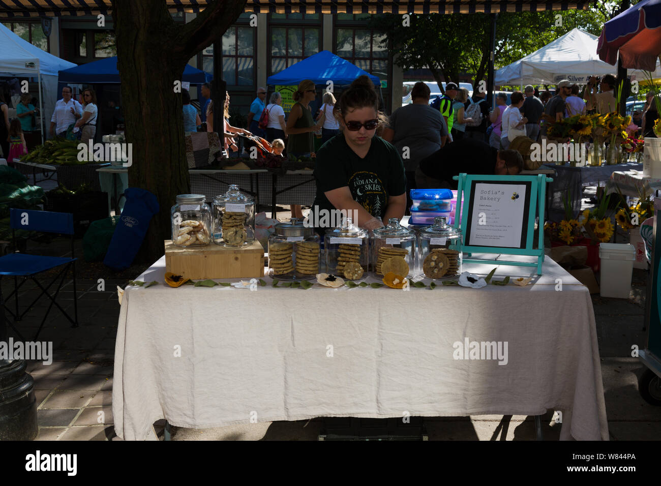 A vendor at the Sofia's Bakery booth at Fort Wayne's Farmers' Market
