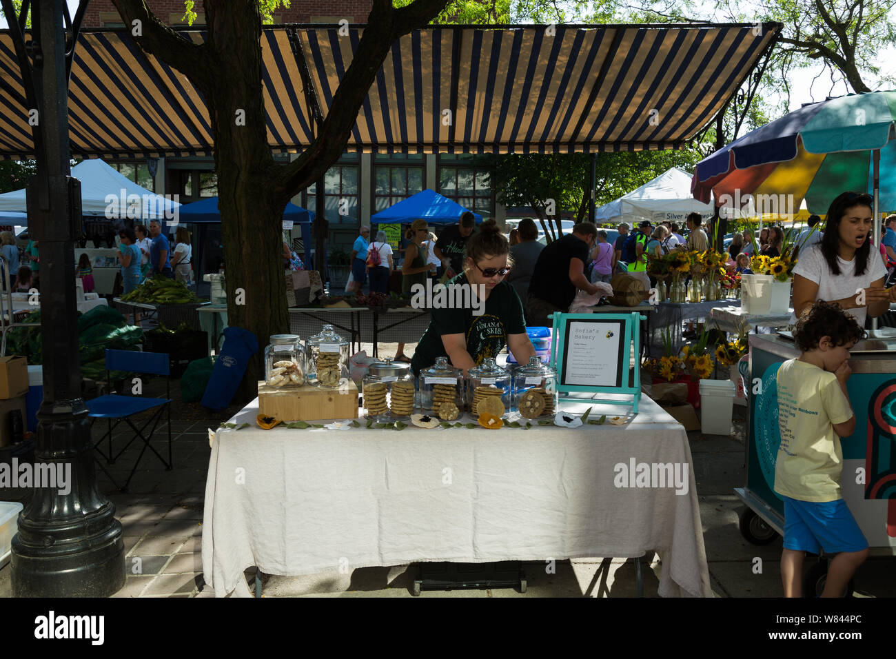 A vendor at the Sofia's Bakery booth at Fort Wayne's Farmers' Market