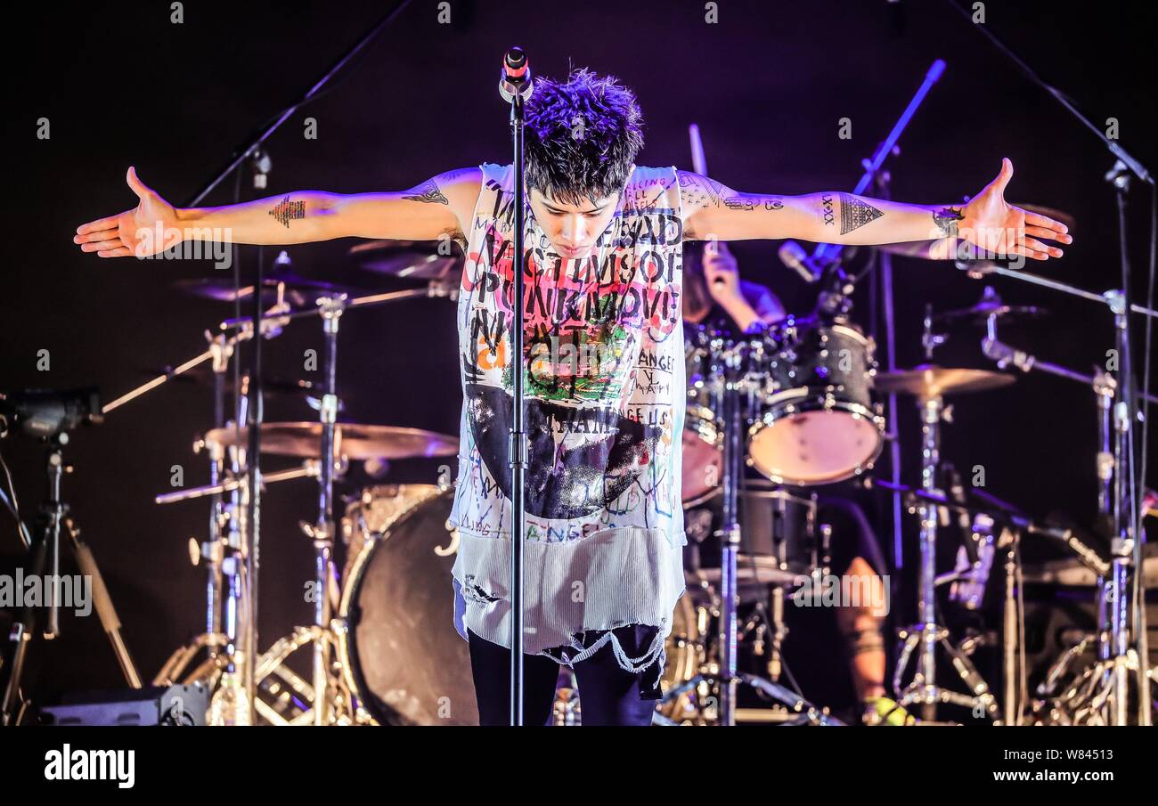 A member of Japanese rock band One Ok Rock performs at a concert in  Shanghai, China, 22 November 2016 Stock Photo - Alamy