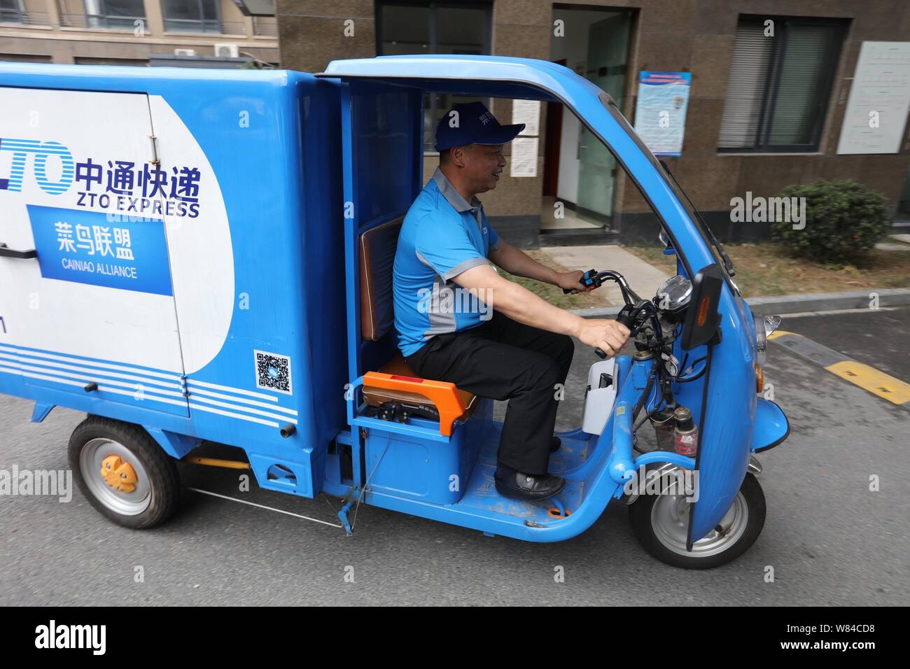 FILE--A delivery vehicle of ZTO Express rides on a road in Shanghai, China,  4 December 2017. Chinese courier ZTO Express will form a logistics jo Stock  Photo - Alamy