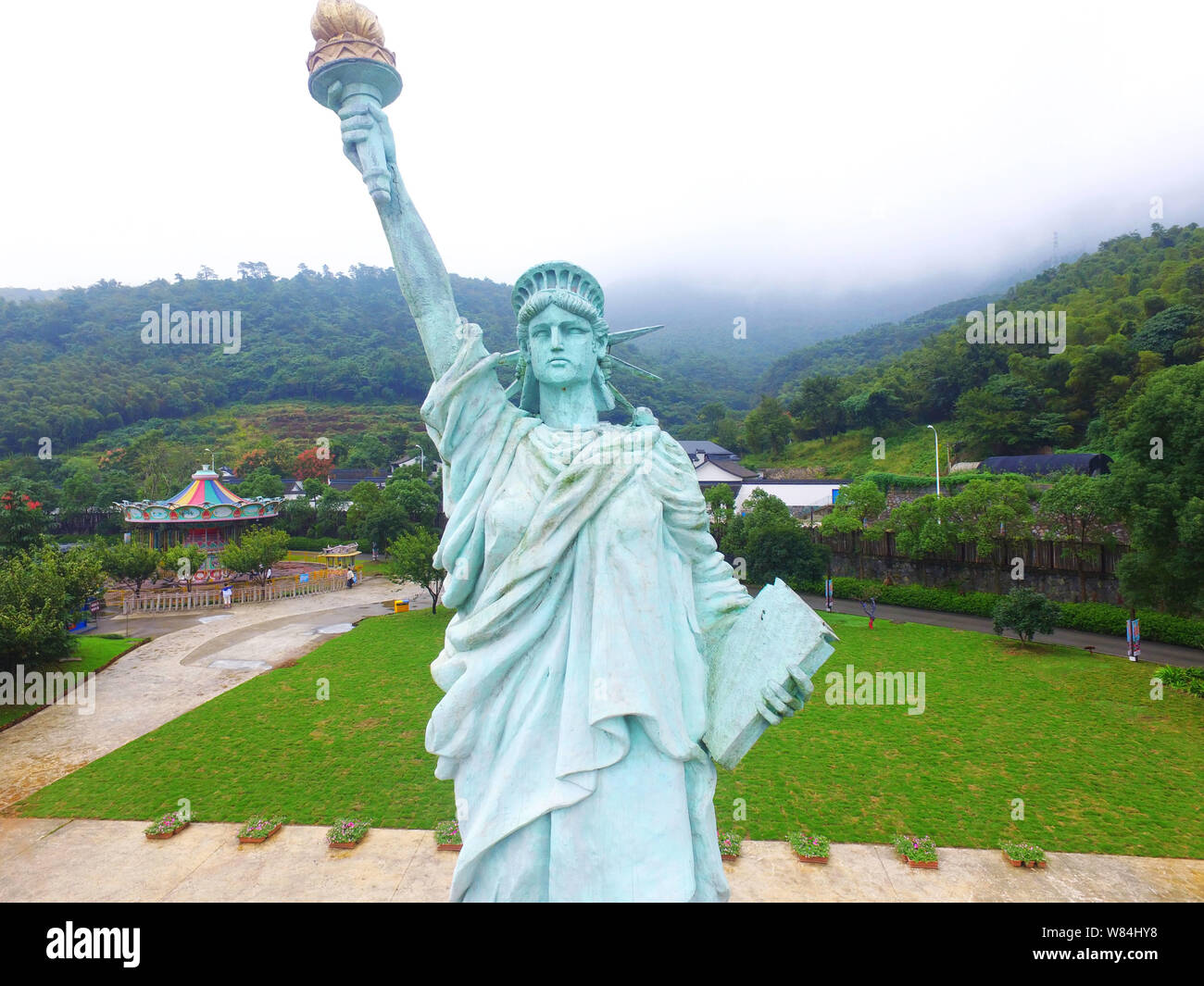 Aerial view of a replica of the Statue of Liberty at a scenic spot in