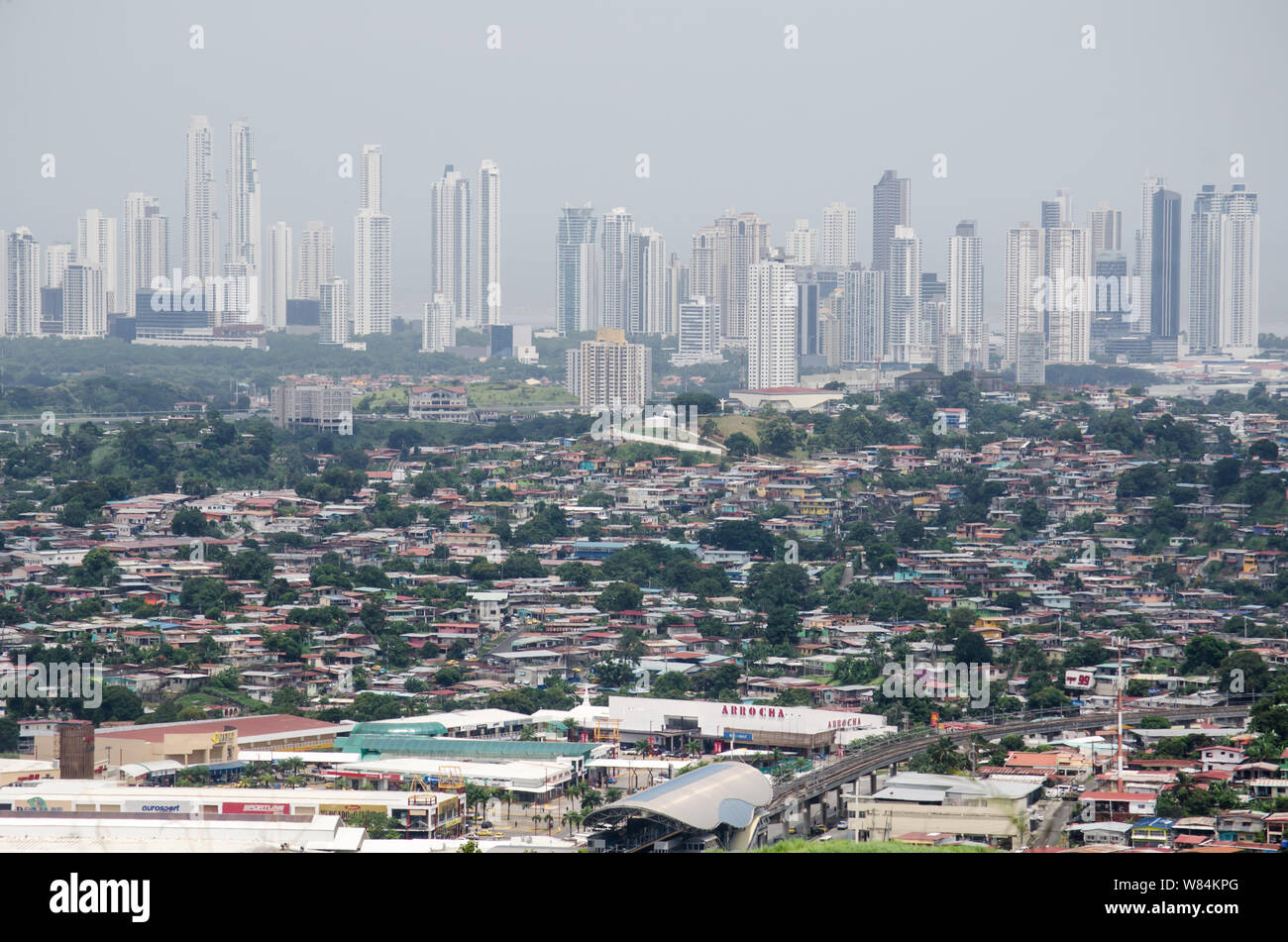 Landscape showing the the contrast between the populated San Miguelito neighborhoods and the exclusive Costa del Este area in the background Stock Photo