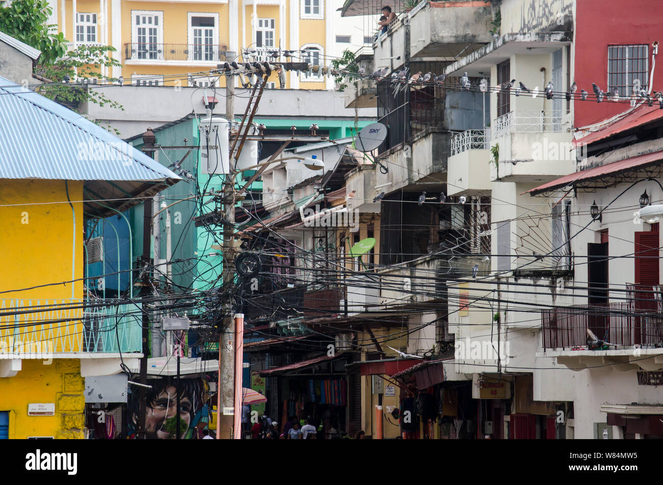 A tangle of cables is seen between the old buildings of Salsipuedes between Santa Ana (right) and Casco Antiguo (left). Stock Photo