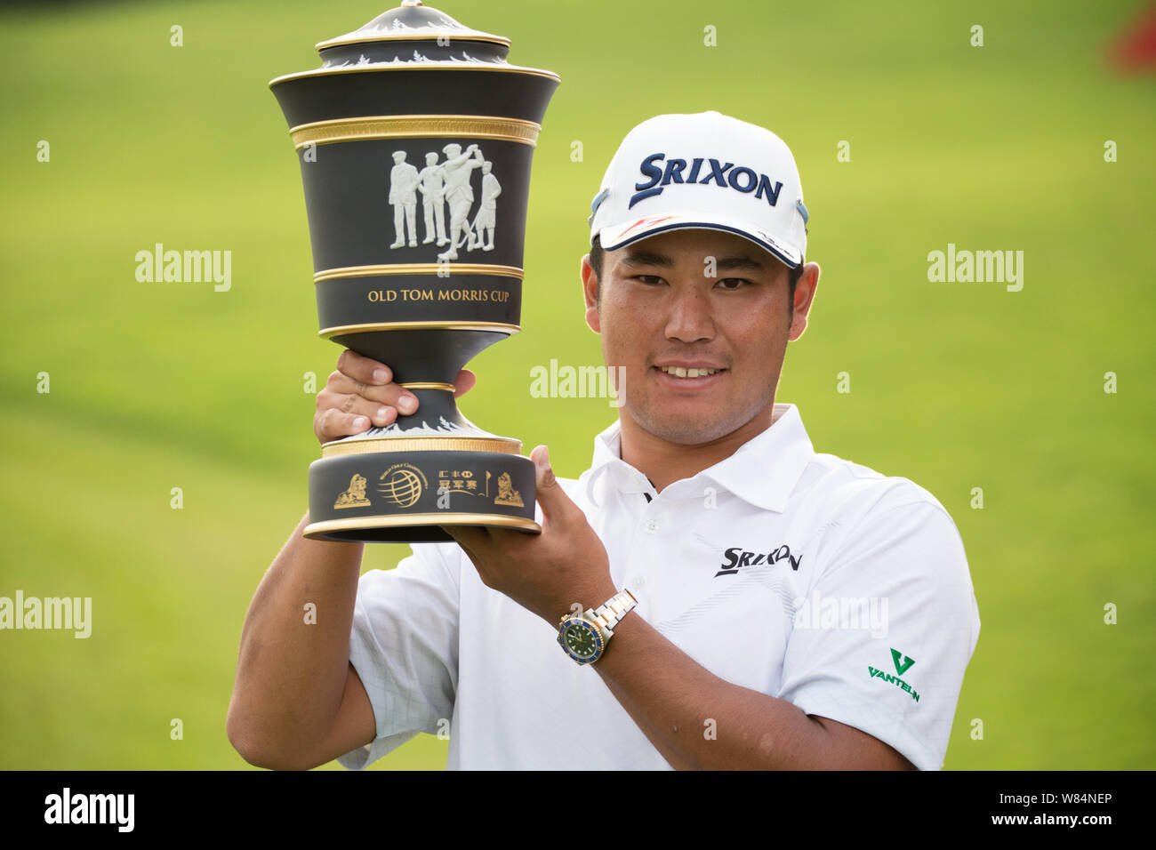 Hideki Matsuyama of Japan poses with his champion trophy after winning the 2016 WGC-HSBC Champions golf tournament in Shanghai, China, 30 October 2016 Stock Photo