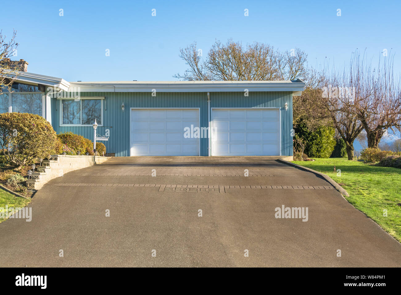 Double Gates Garage Of Big Residential House Stock Photo