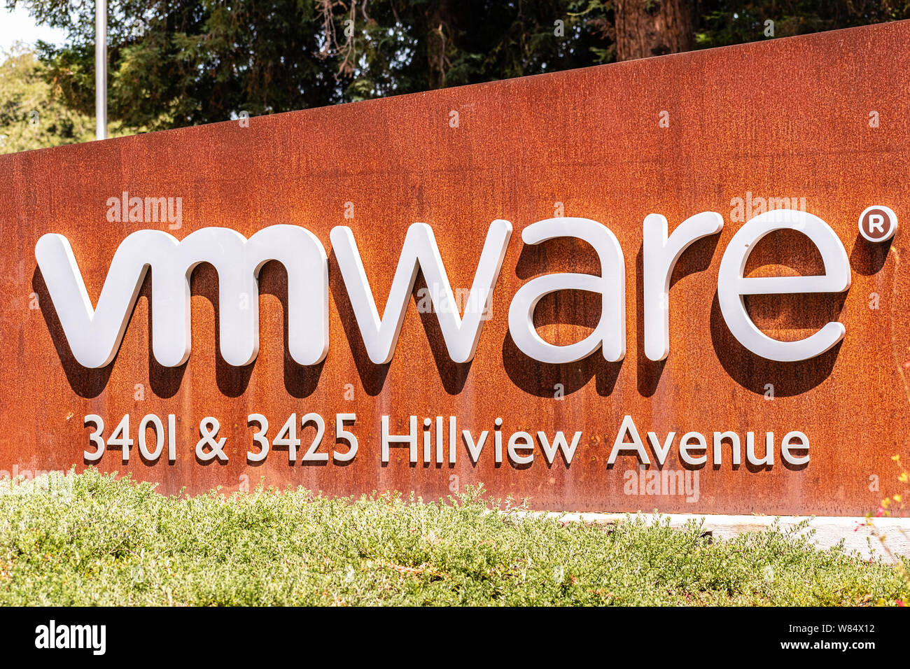 August 5, 2019 Palo Alto / CA / USA - Sign located at the entrance to VMware offices located in Silicon Valley; VMware provides cloud computing and pl Stock Photo