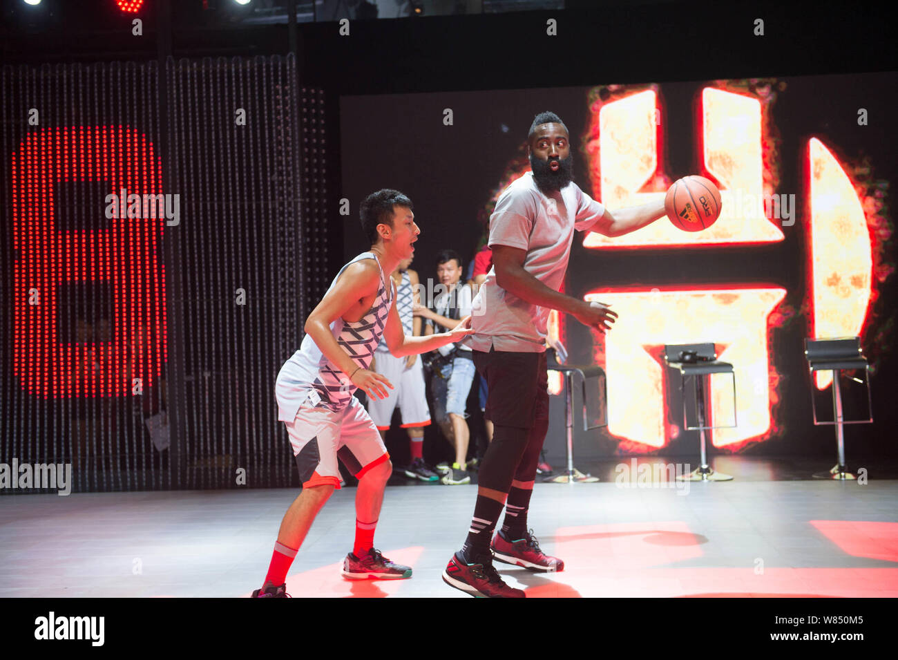 NBA star Harden, right, plays basketball during a promotional for Adidas in Beijing, China, September 2016 Stock Photo - Alamy