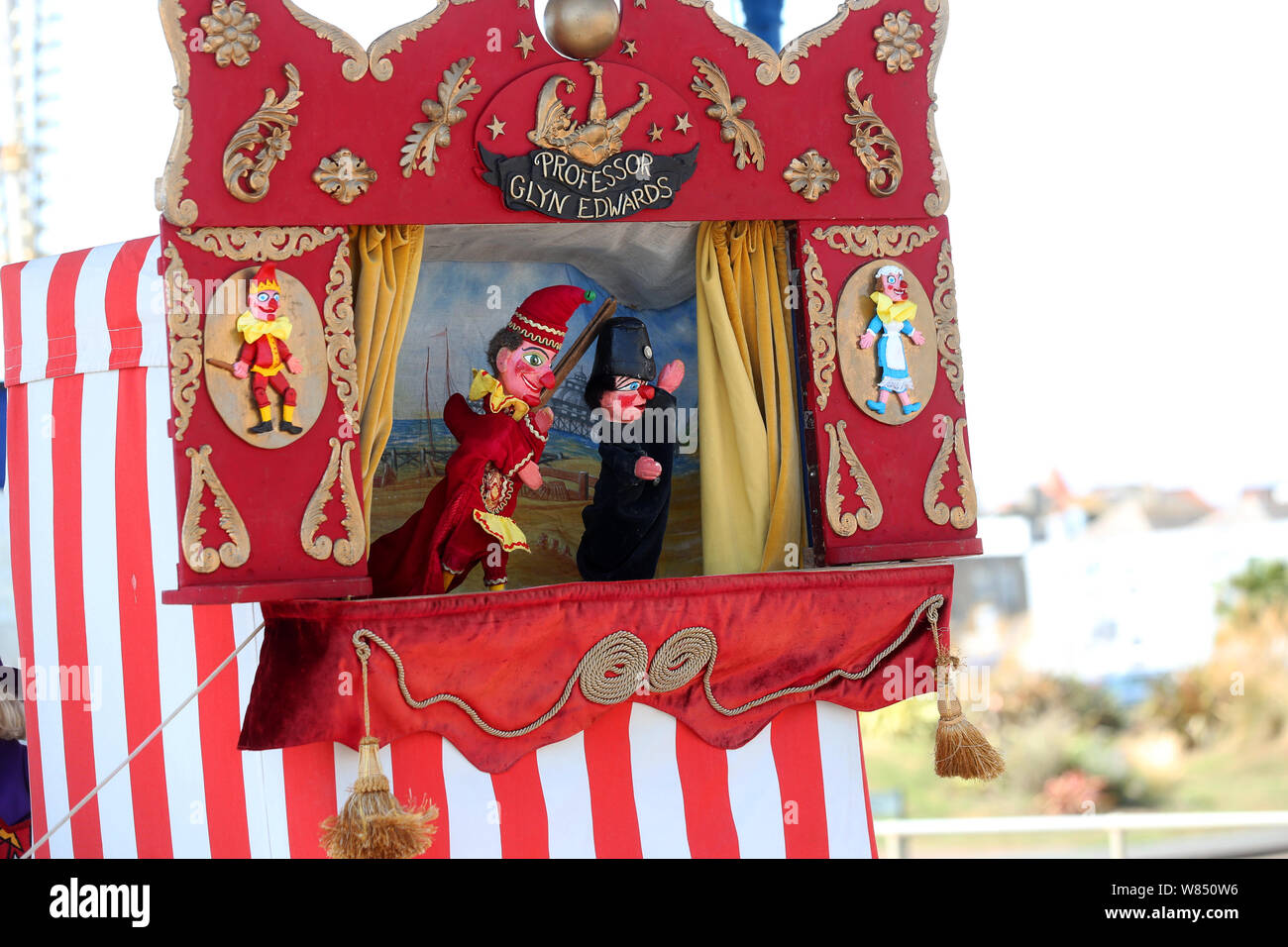 Punch and Judy show on Bognor Regis seafront, West Sussex, UK Stock