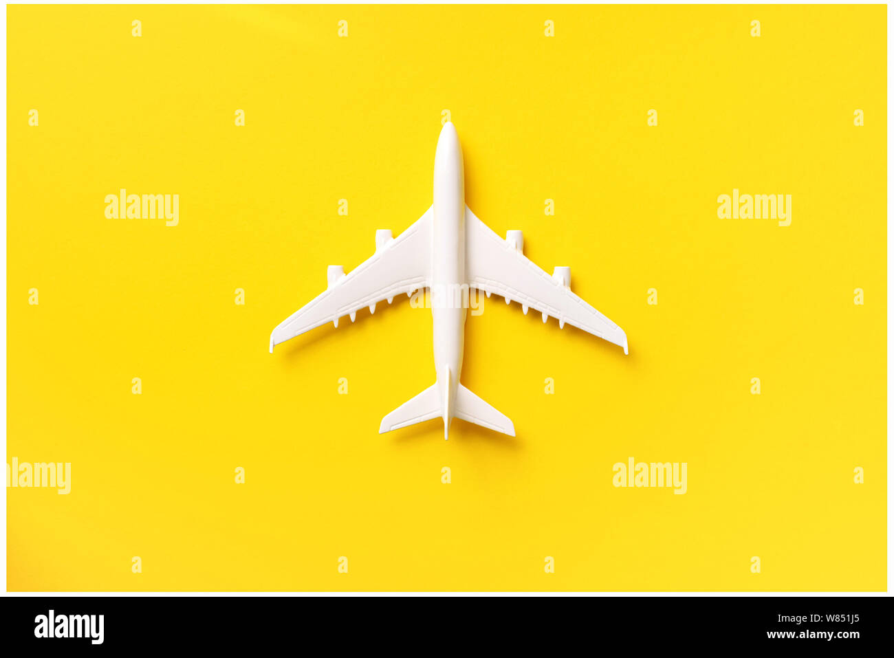 White plane, airplane on yellow color background with copy space. Top view,  flat lay. Minimal style design. Travel, vacation concept. Banner Stock  Photo - Alamy
