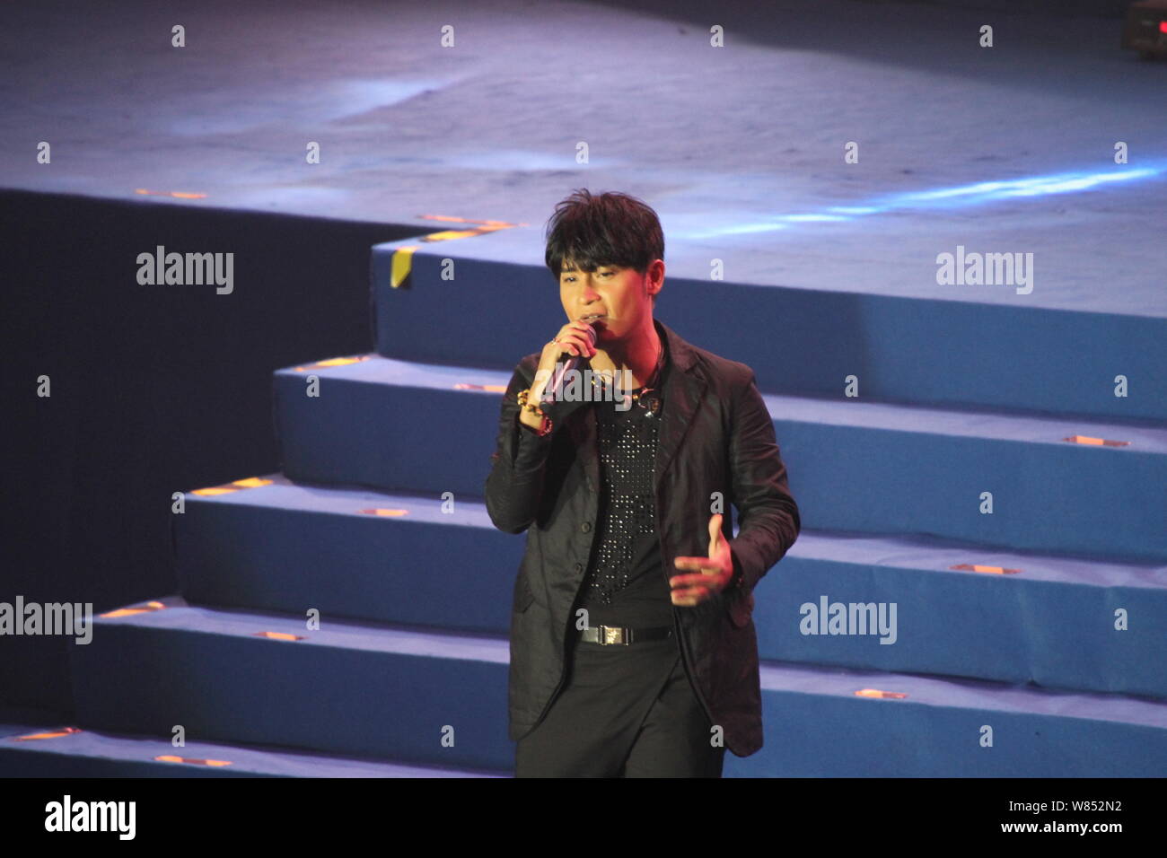 Taiwanese singer Julian Chen performs at an all-star concert in Xuchang ...