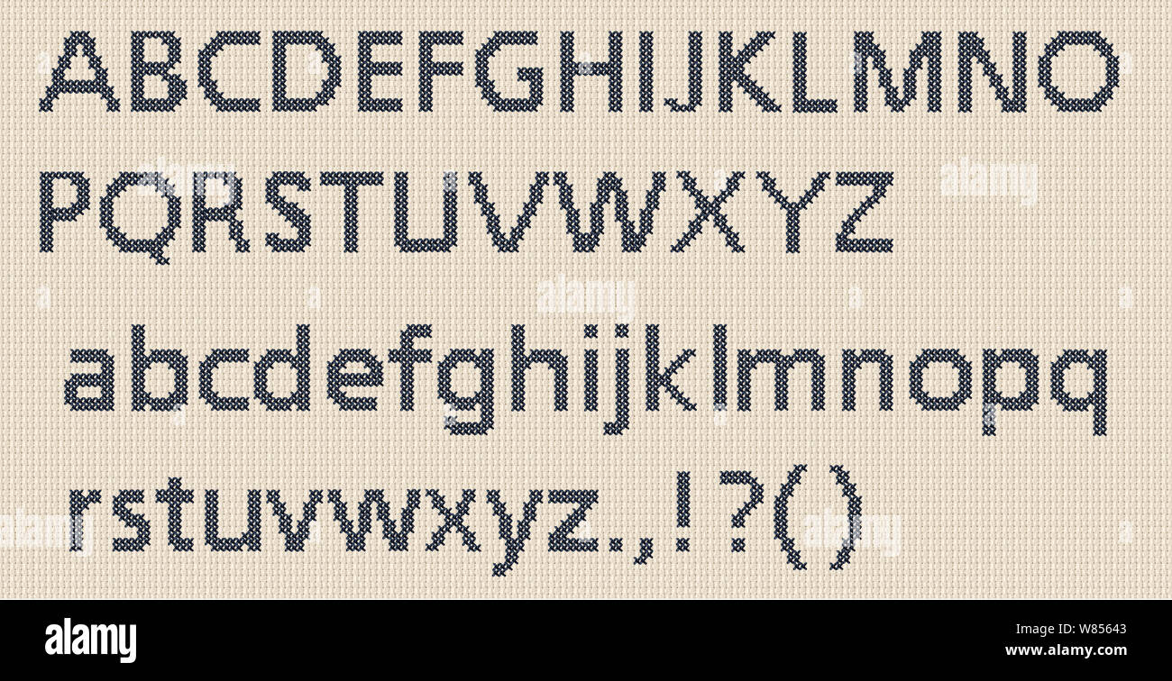Cross stitch lettering alphabet, lower and upper case on a cross stich fabric Stock Photo