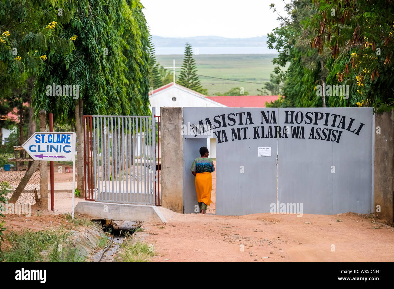 Sign points to the catholic St. Clare Clinic of the German missionary doctor Thomas Brei, in Mwanza, Tanzania, Africa Stock Photo